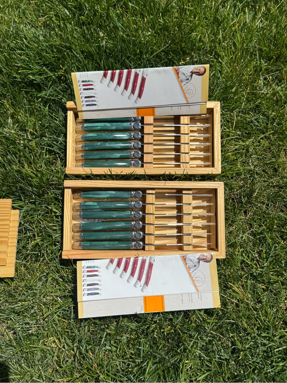 Wolfgang Puck 12 pc steak knife set in wooden slide-top boxes